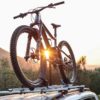 Roof rack mounted bicycle carrier for up to 3 bikes